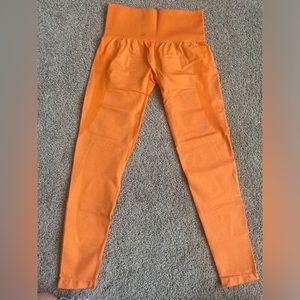 NVGTN Sunset Orange Curve Seamless Leggings